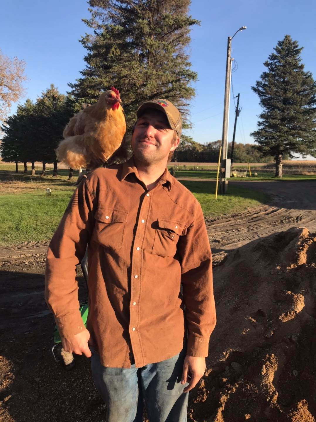 farmer Travis and a chicken.jpg